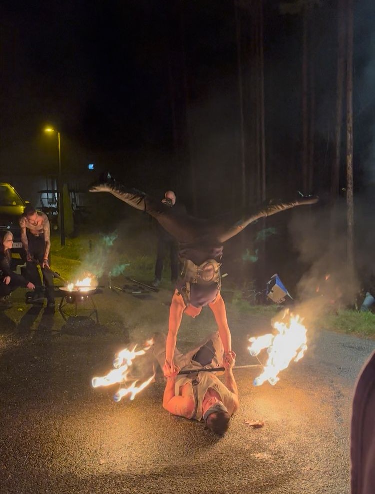 Fire acts handenstand dragonstaff